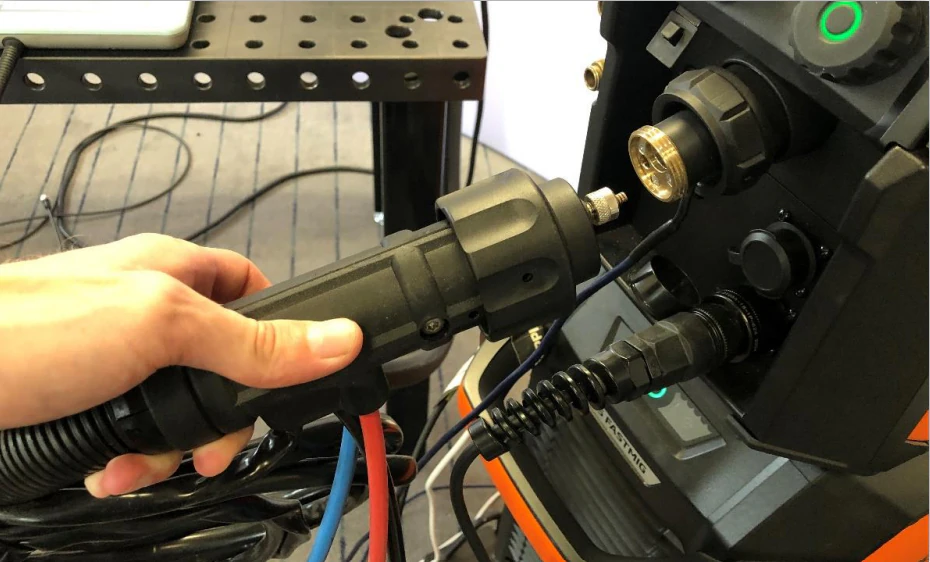 Hose package connected to the power source